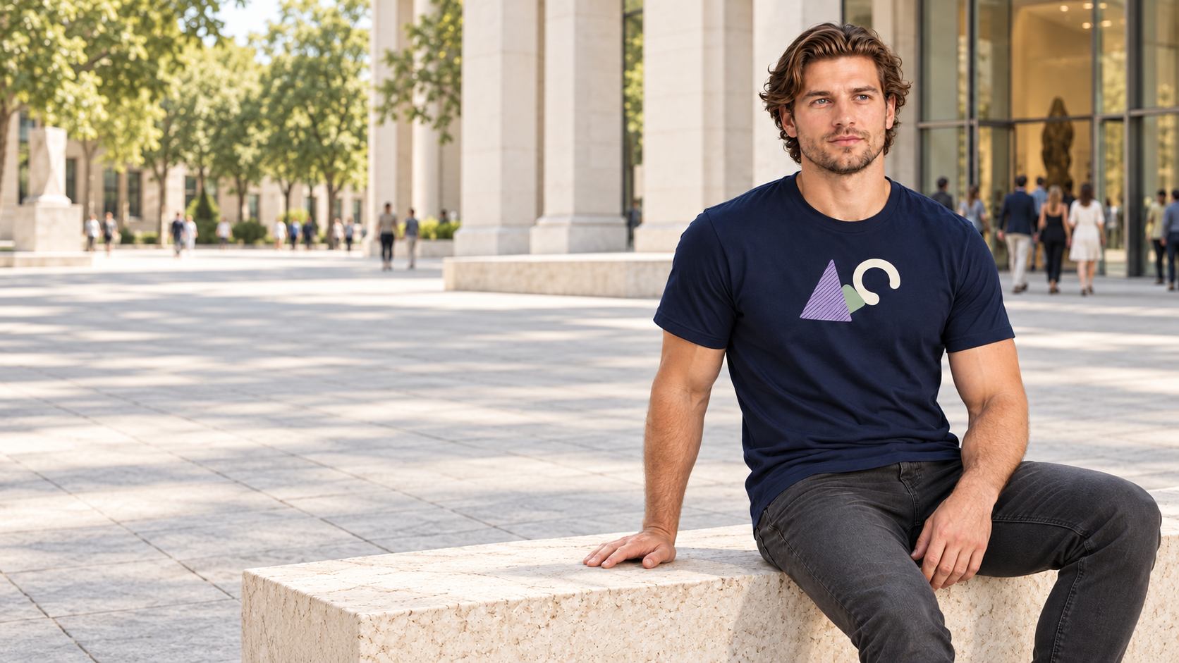 Model wearing an Iconic Mark navy crewneck T-shirt